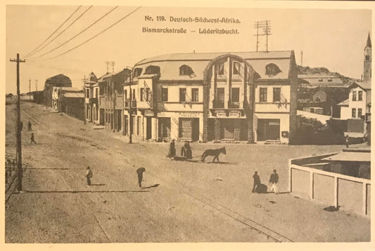 PC 0056 GSWA postcard - Buildings in Bismarckstreet, Lüderitz Bay /  DSWA Postkarte - Gebäude in der Bismarckstrasse, Lüderitzbucht - Nachdruck: Peter's Antiques