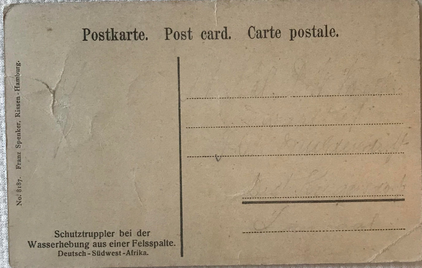 PC STR 12.2. DSWA Schutztruppler bei Wasserstelle / DSWA Schutztruppler lifting water from a crevice