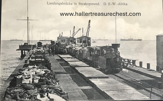 PC SWK-LUD 2.1. DSWA Postkarte - Swakopmunder Landungsbrücke mit Zwillingsbahn / GSWA postcard - Swakopmund Jetty with Twin train