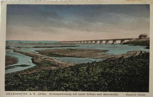 PC SWK 11.2. SWA Postkarte - Swakopmündung mit neuer Brücke und Motortrolly / SWA postcard - Swakop estuary with new bridge