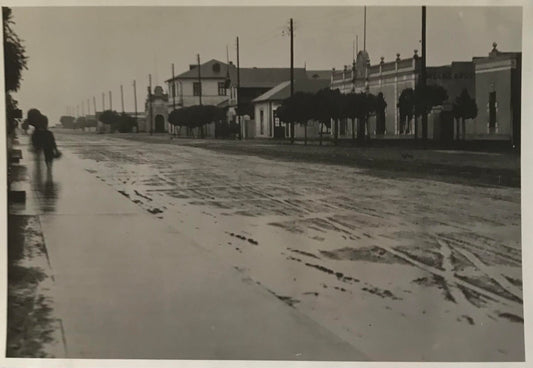 PC SWK 12.6. SWA Postkarte - Kaiserstrasse nach dem Regen, Swakopmund, 1934 / SWA Postcard - Kaiserstrasse after the rain, Swakopmund, 1934, Wecke & Voigts