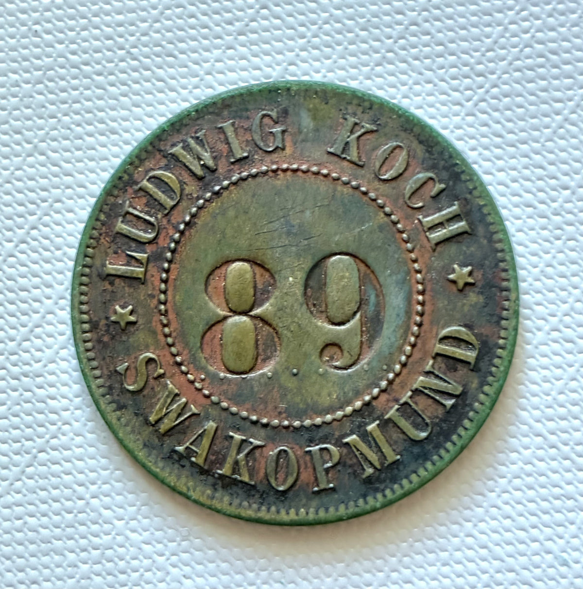 Token 16 – DSWA – German South West Africa – Ludwig Koch, Swakopmund – Control No. 89, c. 1900–1914