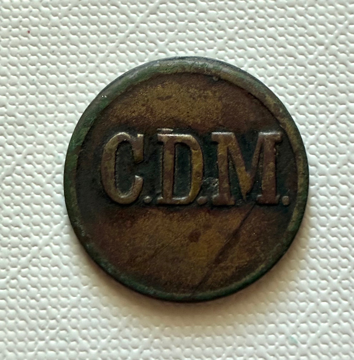 Token 23 – South-West Africa – C.D.M. – 6d Diamond Mine Token, c. 1920–1950