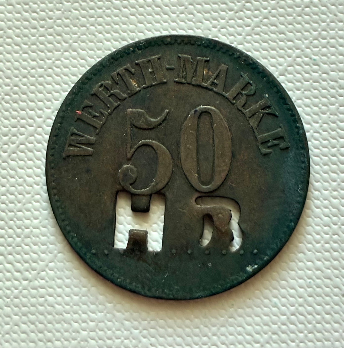 Token 33 – German South West Africa – “WERTH-MARKE 50” – Hotel R. – Private Hotel Token