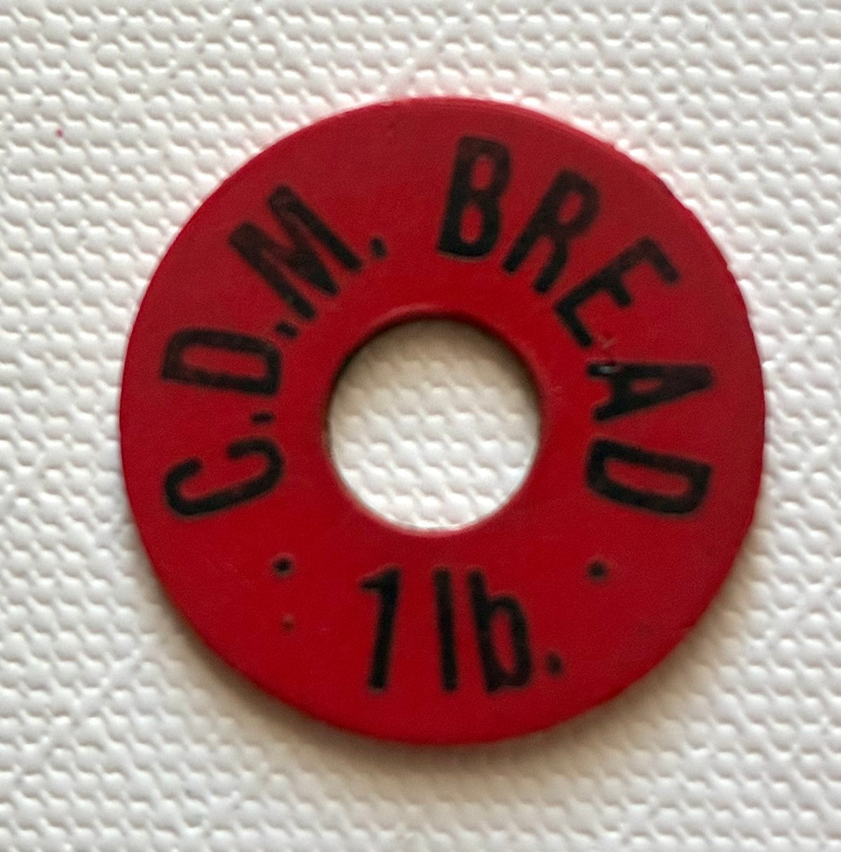 Token 39 – South West Africa – C.D.M. Bread 1 LB Token – Red
